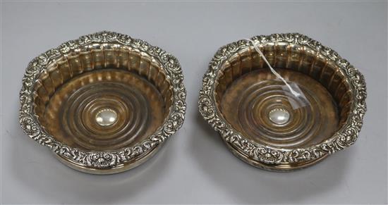 A pair of 19th century Old Sheffield, plate wine coasters, 17cm.